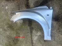 levý přední blatník EU - ORIGINÁLNÍ DÍL - poškozený